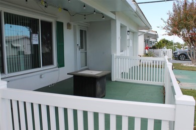 Welcome to this beautifully maintained Eden home with 1598 sq ft on Mainlands Golf Club in Florida - for sale on GolfHomes.com, golf home, golf lot