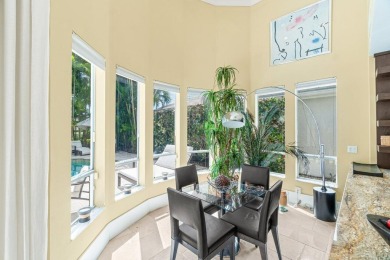 Experience luxury and comfort in this beautifully updated on Boca Delray Golf and Country Club in Florida - for sale on GolfHomes.com, golf home, golf lot