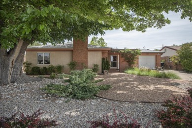 The quintessential mid-century modern home in North Campus! on North Course - University of New Mexico  in New Mexico - for sale on GolfHomes.com, golf home, golf lot