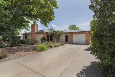 The quintessential mid-century modern home in North Campus! on North Course - University of New Mexico  in New Mexico - for sale on GolfHomes.com, golf home, golf lot