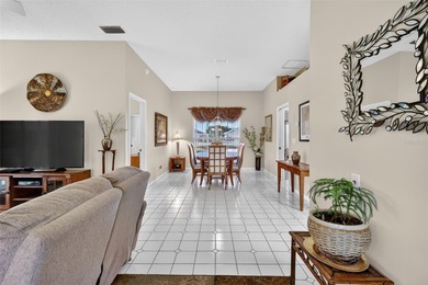 Welcome to this immaculate, light-filled lake view home nestled on Monarch At Royal Highlands in Florida - for sale on GolfHomes.com, golf home, golf lot