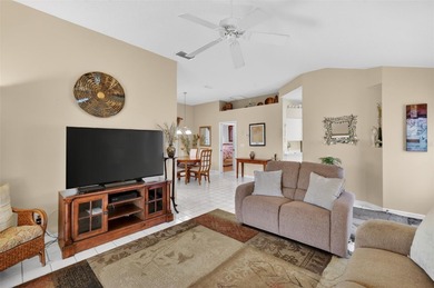 Welcome to this immaculate, light-filled lake view home nestled on Monarch At Royal Highlands in Florida - for sale on GolfHomes.com, golf home, golf lot