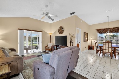 Welcome to this immaculate, light-filled lake view home nestled on Monarch At Royal Highlands in Florida - for sale on GolfHomes.com, golf home, golf lot