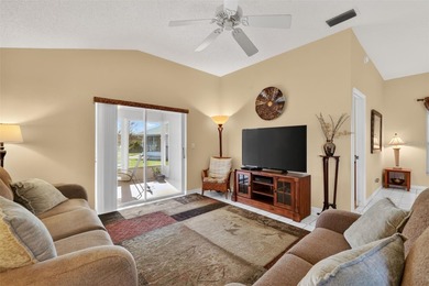 Welcome to this immaculate, light-filled lake view home nestled on Monarch At Royal Highlands in Florida - for sale on GolfHomes.com, golf home, golf lot