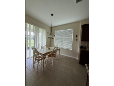 Beautiful golf course home in the 55+ gated community of on Arlington Ridge Golf Club in Florida - for sale on GolfHomes.com, golf home, golf lot