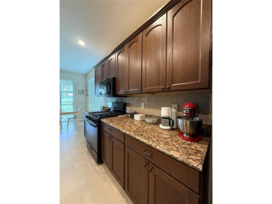 Beautiful golf course home in the 55+ gated community of on Arlington Ridge Golf Club in Florida - for sale on GolfHomes.com, golf home, golf lot