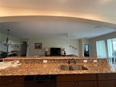 Beautiful golf course home in the 55+ gated community of on Arlington Ridge Golf Club in Florida - for sale on GolfHomes.com, golf home, golf lot