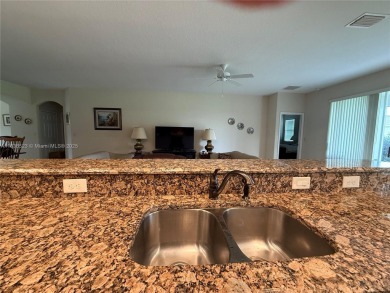 Beautiful golf course home in the 55+ gated community of on Arlington Ridge Golf Club in Florida - for sale on GolfHomes.com, golf home, golf lot