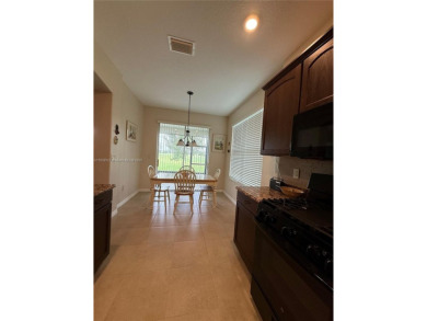 Beautiful golf course home in the 55+ gated community of on Arlington Ridge Golf Club in Florida - for sale on GolfHomes.com, golf home, golf lot