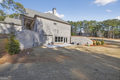 Welcome to this stunning new construction home in Harbor Club on Harbor Club Golf and Country Club in Georgia - for sale on GolfHomes.com, golf home, golf lot