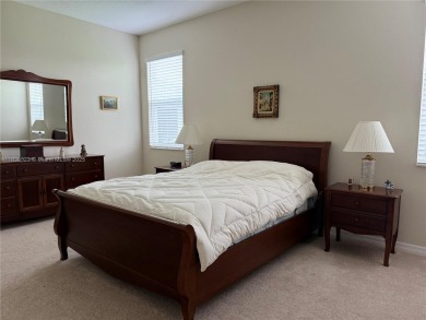 Beautiful golf course home in the 55+ gated community of on Arlington Ridge Golf Club in Florida - for sale on GolfHomes.com, golf home, golf lot