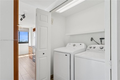 Spacious Corner Condo with Sunset Lake  Golf Views in the Heart on Turnberry Isle Resort and Club in Florida - for sale on GolfHomes.com, golf home, golf lot