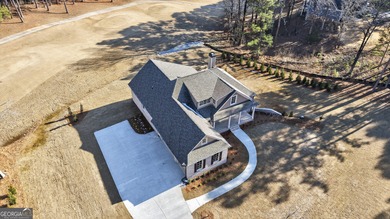 Welcome to this stunning new construction home in Harbor Club on Harbor Club Golf and Country Club in Georgia - for sale on GolfHomes.com, golf home, golf lot