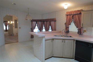 BETMAR ESTATES (55+ Community) 3BR/2BA/HUGE CARPORT Home with on Betmar Acres Golf Club in Florida - for sale on GolfHomes.com, golf home, golf lot