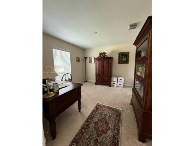 Beautiful golf course home in the 55+ gated community of on Arlington Ridge Golf Club in Florida - for sale on GolfHomes.com, golf home, golf lot