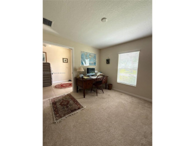 Beautiful golf course home in the 55+ gated community of on Arlington Ridge Golf Club in Florida - for sale on GolfHomes.com, golf home, golf lot