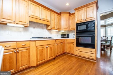 Gorgeous 2-story traditional in swim/tennis/golf/pickleball/lake on Mirror Lake Golf Club in Georgia - for sale on GolfHomes.com, golf home, golf lot