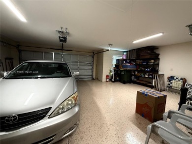 Beautiful golf course home in the 55+ gated community of on Arlington Ridge Golf Club in Florida - for sale on GolfHomes.com, golf home, golf lot