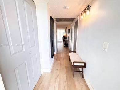 Updated top-floor 2BD/2BA condo with stunning lake views in the on Pine Island Ridge Country Club in Florida - for sale on GolfHomes.com, golf home, golf lot