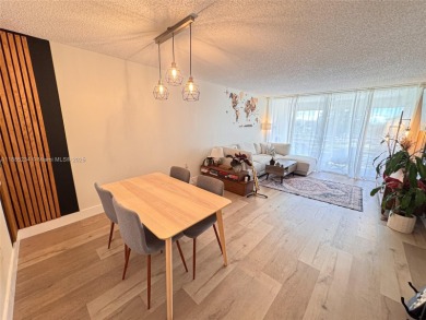 Updated top-floor 2BD/2BA condo with stunning lake views in the on Pine Island Ridge Country Club in Florida - for sale on GolfHomes.com, golf home, golf lot