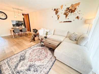 Updated top-floor 2BD/2BA condo with stunning lake views in the on Pine Island Ridge Country Club in Florida - for sale on GolfHomes.com, golf home, golf lot