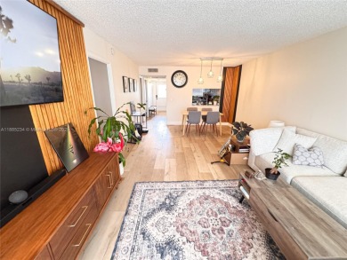 Updated top-floor 2BD/2BA condo with stunning lake views in the on Pine Island Ridge Country Club in Florida - for sale on GolfHomes.com, golf home, golf lot