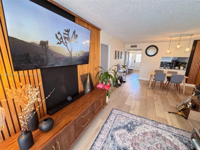Updated top-floor 2BD/2BA condo with stunning lake views in the on Pine Island Ridge Country Club in Florida - for sale on GolfHomes.com, golf home, golf lot