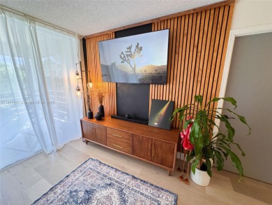 Updated top-floor 2BD/2BA condo with stunning lake views in the on Pine Island Ridge Country Club in Florida - for sale on GolfHomes.com, golf home, golf lot