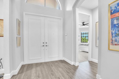 Experience Luxury and South Florida Living at its Finest in this on Wycliffe Golf and Country Club in Florida - for sale on GolfHomes.com, golf home, golf lot