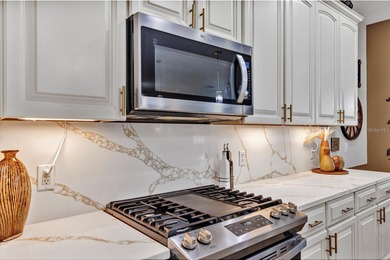 Golf Front 2 Bedroom, 2 bath w/ flex room and over-sized 2 car + on Arlington Ridge Golf Club in Florida - for sale on GolfHomes.com, golf home, golf lot