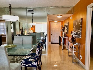 Beautiful fully remodeled pet friendly Cypress Grove Country on Palm-Aire Country Club and Resort - The Oaks in Florida - for sale on GolfHomes.com, golf home, golf lot