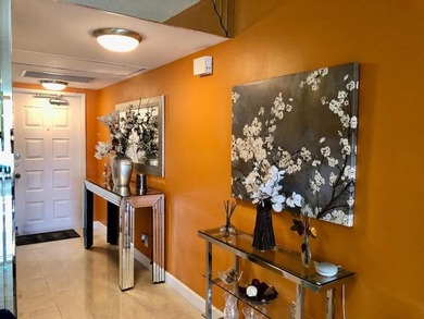 Beautiful fully remodeled pet friendly Cypress Grove Country on Palm-Aire Country Club and Resort - The Oaks in Florida - for sale on GolfHomes.com, golf home, golf lot