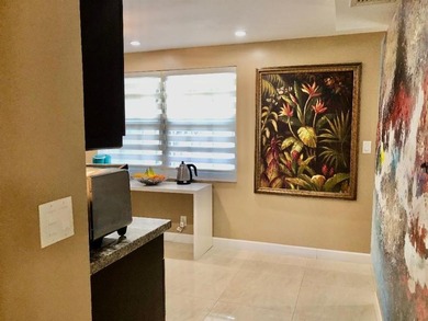 Beautiful fully remodeled pet friendly Cypress Grove Country on Palm-Aire Country Club and Resort - The Oaks in Florida - for sale on GolfHomes.com, golf home, golf lot