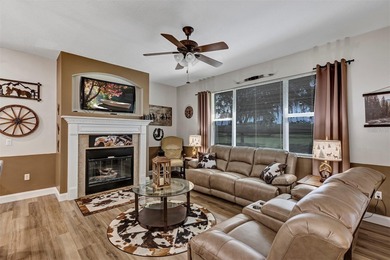 Golf Front 2 Bedroom, 2 bath w/ flex room and over-sized 2 car + on Arlington Ridge Golf Club in Florida - for sale on GolfHomes.com, golf home, golf lot