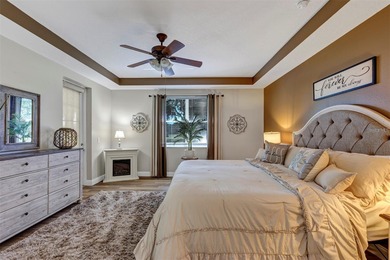 Golf Front 2 Bedroom, 2 bath w/ flex room and over-sized 2 car + on Arlington Ridge Golf Club in Florida - for sale on GolfHomes.com, golf home, golf lot