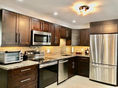 Beautiful fully remodeled pet friendly Cypress Grove Country on Palm-Aire Country Club and Resort - The Oaks in Florida - for sale on GolfHomes.com, golf home, golf lot