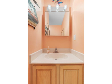 Ultra clean, nicely furnished 2BR/2BA condo tucked into the NW on The American Golf Club in Florida - for sale on GolfHomes.com, golf home, golf lot