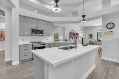 Experience Luxury and South Florida Living at its Finest in this on Wycliffe Golf and Country Club in Florida - for sale on GolfHomes.com, golf home, golf lot
