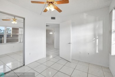 Great 2 bedroom / 2 bath unit located on the second floor on Flamingo Lakes Country Club in Florida - for sale on GolfHomes.com, golf home, golf lot