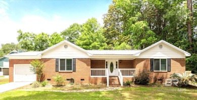 This remodeled 3-bedroom, 2-bath brick home is centrally located on Lake Forest Yacht and Country Club in Alabama - for sale on GolfHomes.com, golf home, golf lot