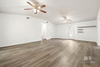 This remodeled 3-bedroom, 2-bath brick home is centrally located on Lake Forest Yacht and Country Club in Alabama - for sale on GolfHomes.com, golf home, golf lot