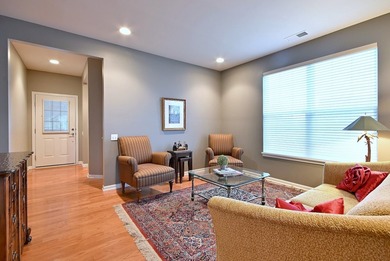 Welcome home to this beautifully maintained, sun-filled home on Whisper Creek Golf Club in Illinois - for sale on GolfHomes.com, golf home, golf lot