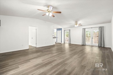 This remodeled 3-bedroom, 2-bath brick home is centrally located on Lake Forest Yacht and Country Club in Alabama - for sale on GolfHomes.com, golf home, golf lot