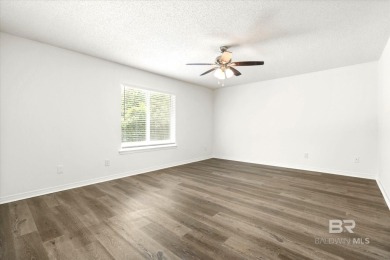 This remodeled 3-bedroom, 2-bath brick home is centrally located on Lake Forest Yacht and Country Club in Alabama - for sale on GolfHomes.com, golf home, golf lot