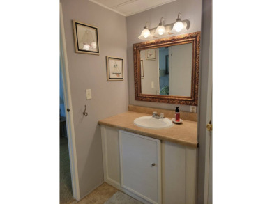 This beautifully maintained home exudes warmth and comfort from on Rolling Greens Executive Golf Community in Florida - for sale on GolfHomes.com, golf home, golf lot