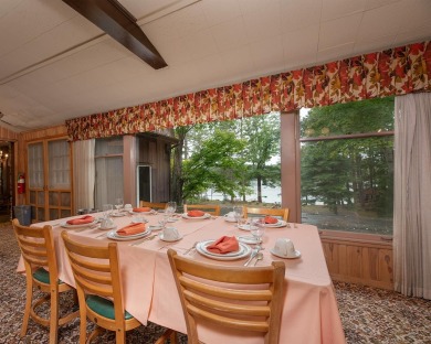 The nostalgic 3 season main lodge at the Froelich's Sayner Lodge on Plum Lake Golf Club in Wisconsin - for sale on GolfHomes.com, golf home, golf lot