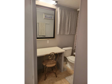 This beautifully maintained home exudes warmth and comfort from on Rolling Greens Executive Golf Community in Florida - for sale on GolfHomes.com, golf home, golf lot
