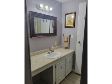 This beautifully maintained home exudes warmth and comfort from on Rolling Greens Executive Golf Community in Florida - for sale on GolfHomes.com, golf home, golf lot