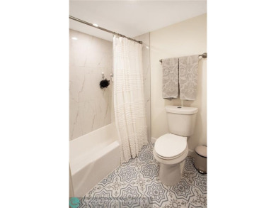 Gorgeous 2/2 condo in a desired golf community of PalmAire - on Palm-Aire Country Club and Resort - Palms in Florida - for sale on GolfHomes.com, golf home, golf lot