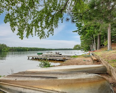 The nostalgic 3 season main lodge at the Froelich's Sayner Lodge on Plum Lake Golf Club in Wisconsin - for sale on GolfHomes.com, golf home, golf lot